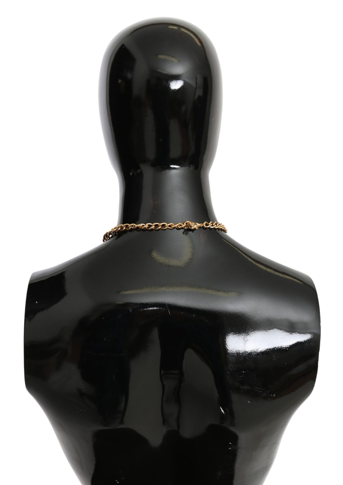 Collar con colgante de flor de cristal de latón dorado y hojas verdes de Dolce & Gabbana
