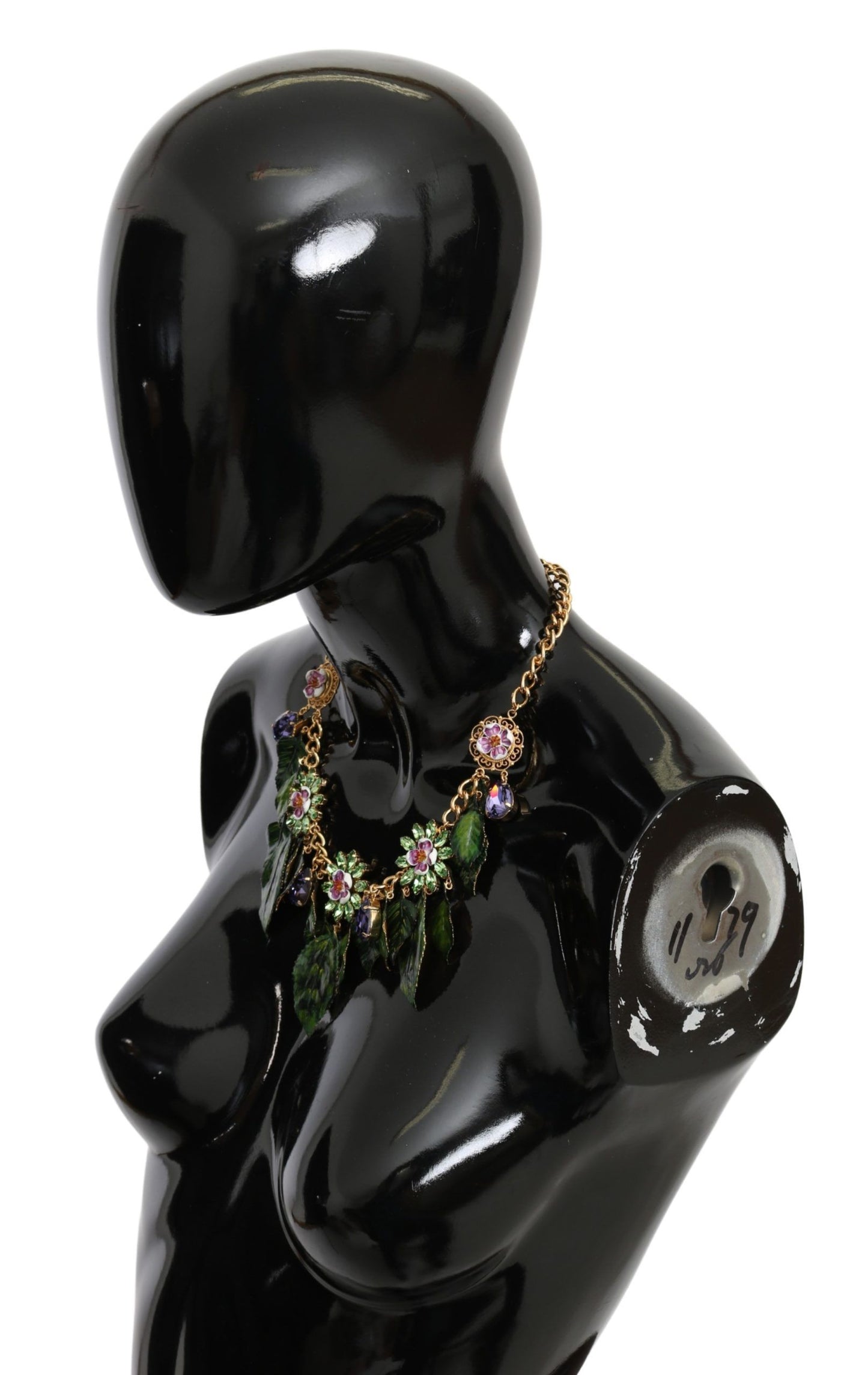 Collar con colgante de flor de cristal de latón dorado y hojas verdes de Dolce & Gabbana