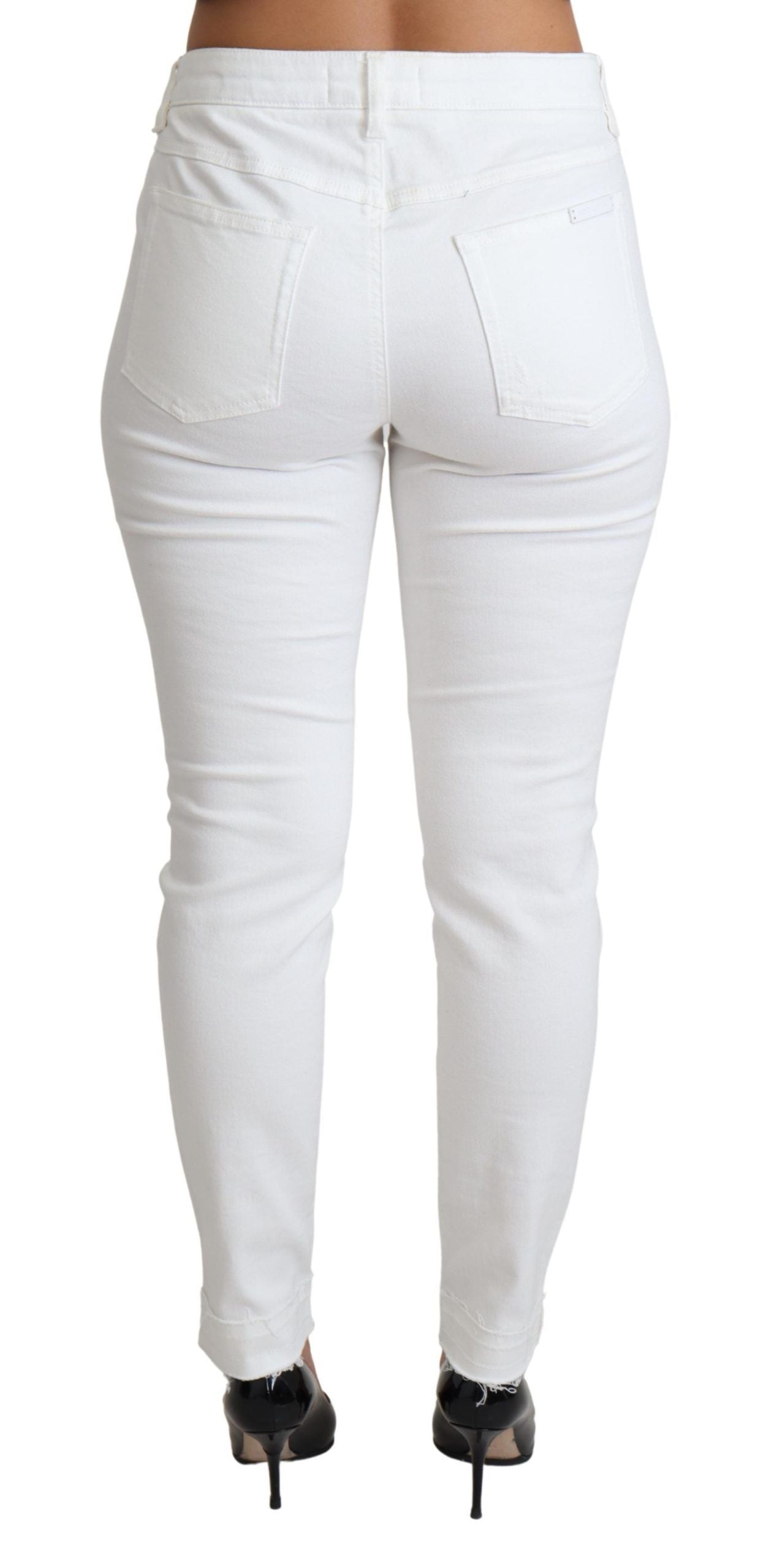 Jeans ajustados Dolce & Gabbana de algodón elástico blanco rasgado