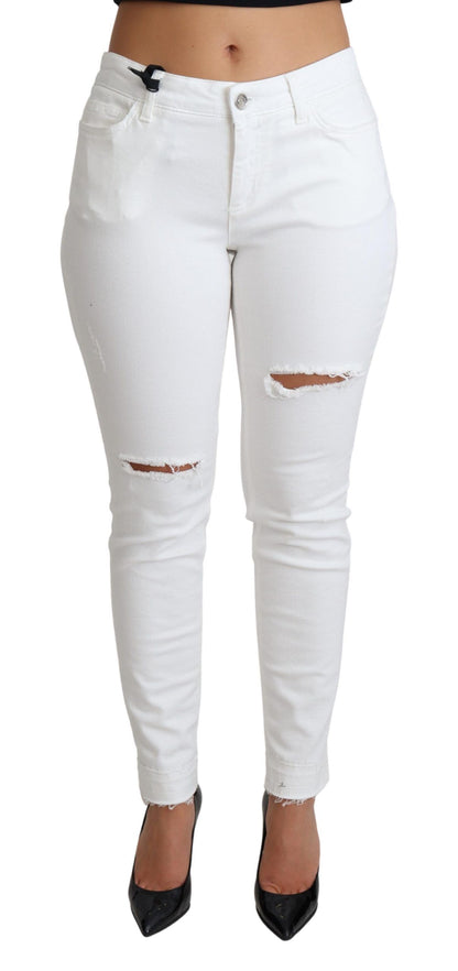 Jeans ajustados Dolce & Gabbana de algodón elástico blanco rasgado
