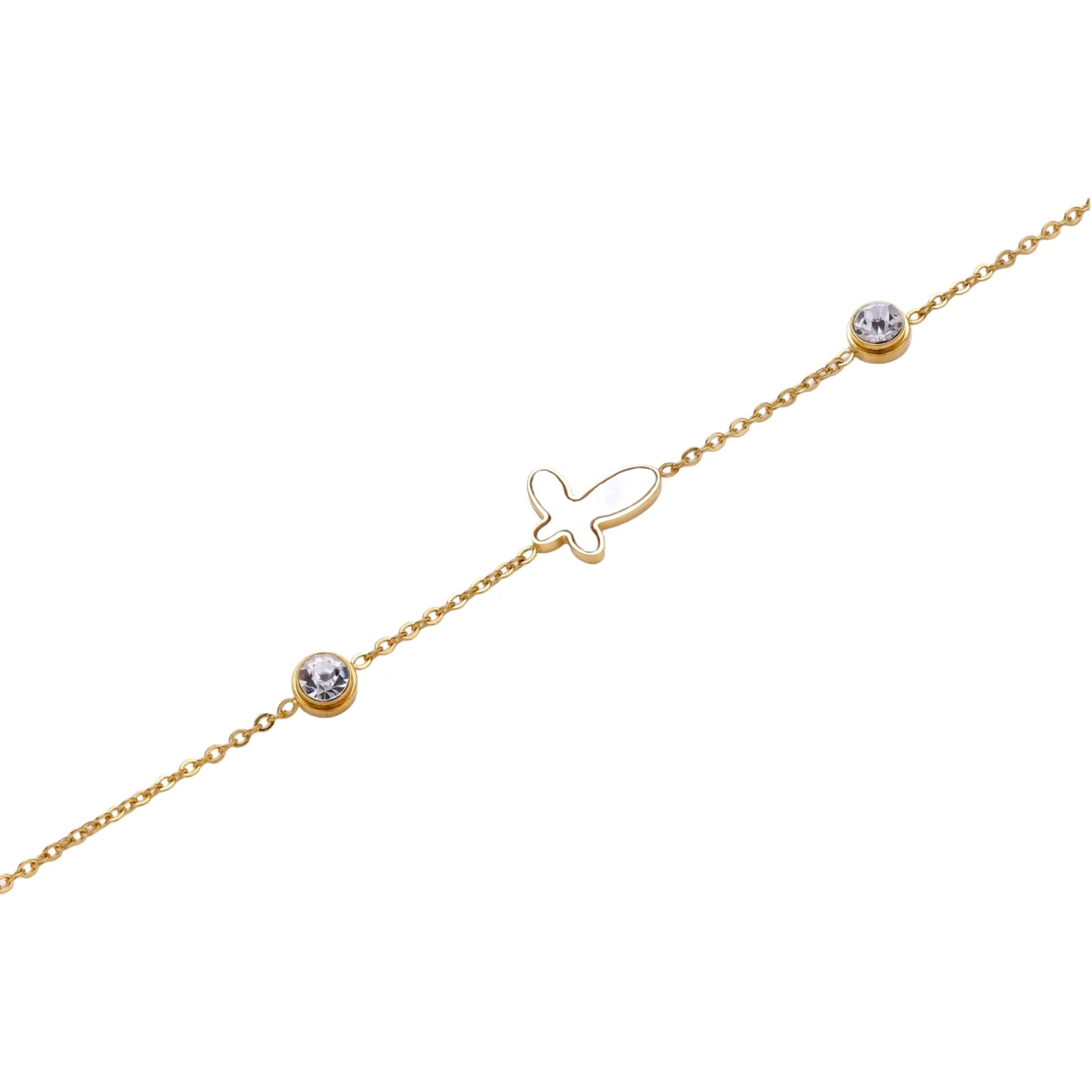 Gold chain bracelet with white mother of pearl butterfly pendant and two bezel-set crystals on cream background