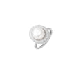 Silver ring with lustrous white pearl center surrounded by sparkling crystal halo on light background.