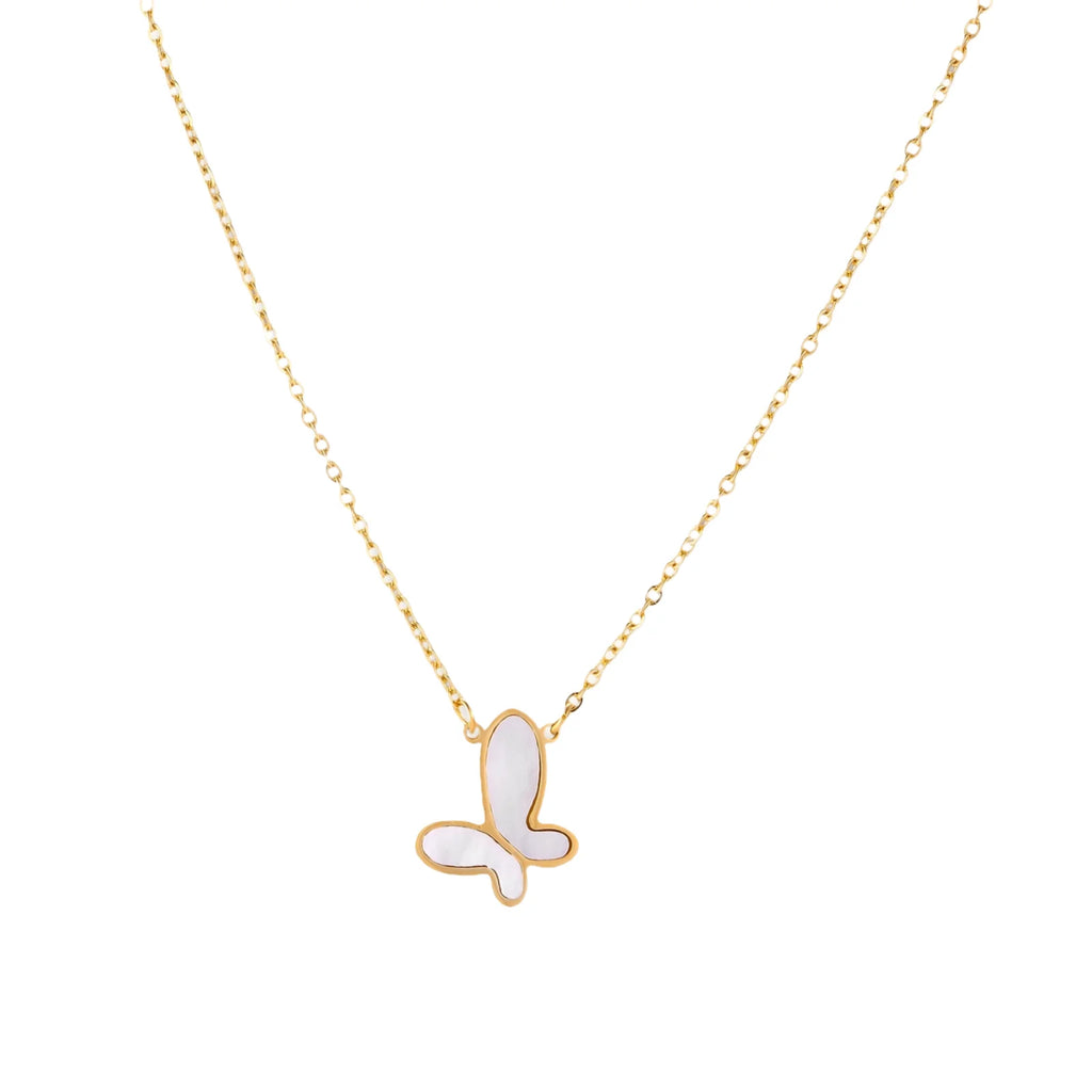 Gold-plated butterfly pendant with iridescent mother of pearl inlay on delicate chain against cream background.