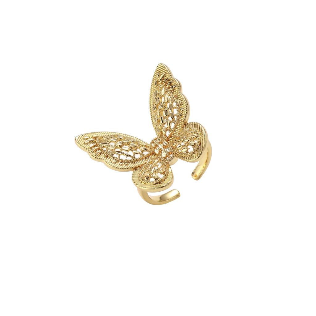 Intricate gold-plated butterfly ring with filigree cutout wings and adjustable band on white background.