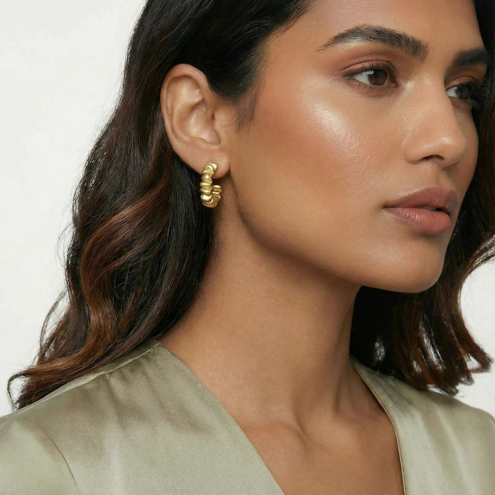 Aros de oro retorcidos