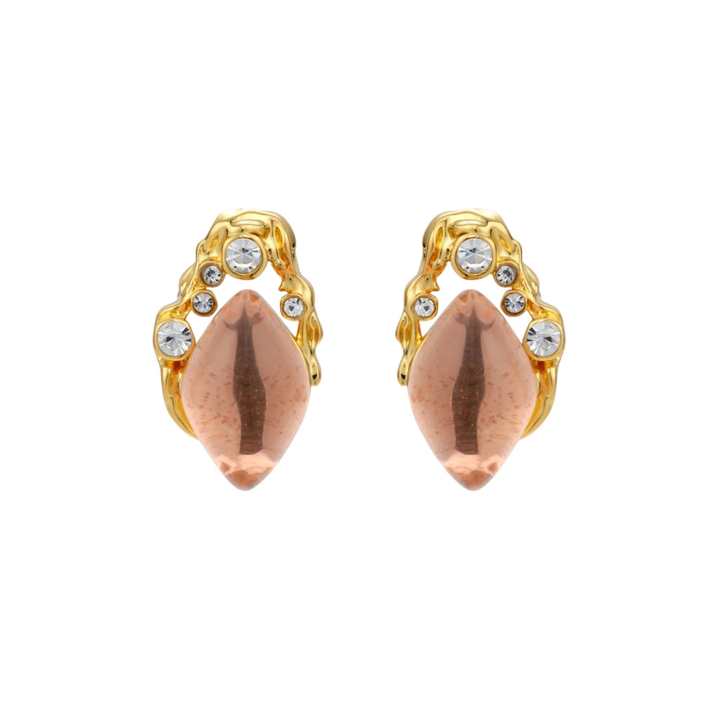 Gold-plated baroque stud earrings with coral-pink liuli stones and cubic zirconia crystals on white background.