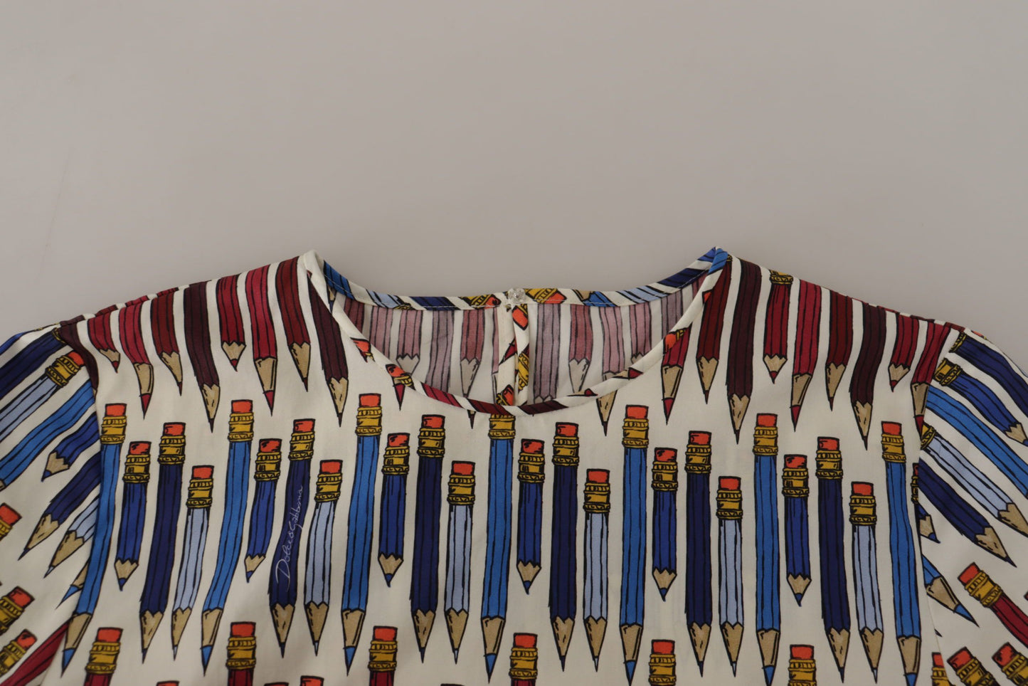 Camiseta-blusa de algodón blanca con estampado de lápices de Dolce & Gabbana