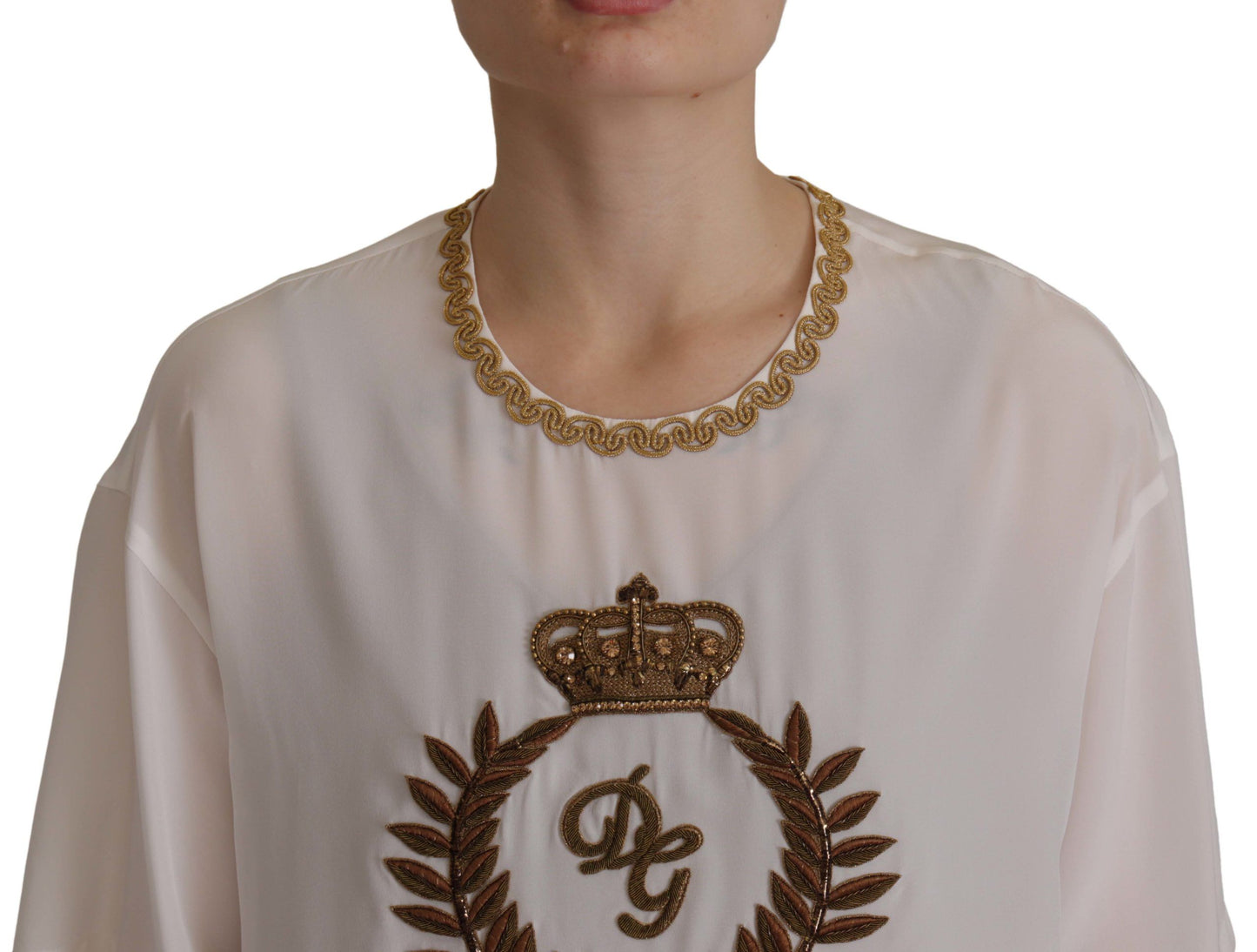 Blusa de seda blanca con corona DG dorada y cristales de Dolce & Gabbana