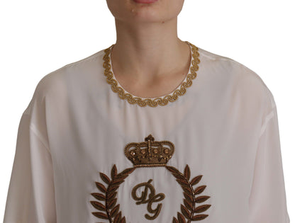 Blusa de seda blanca con corona DG dorada y cristales de Dolce & Gabbana
