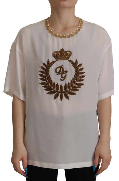 Blusa de seda blanca con corona DG dorada y cristales de Dolce & Gabbana