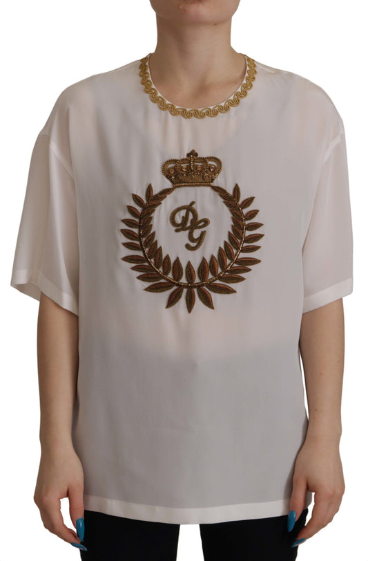 Blusa de seda blanca con corona DG dorada y cristales de Dolce & Gabbana