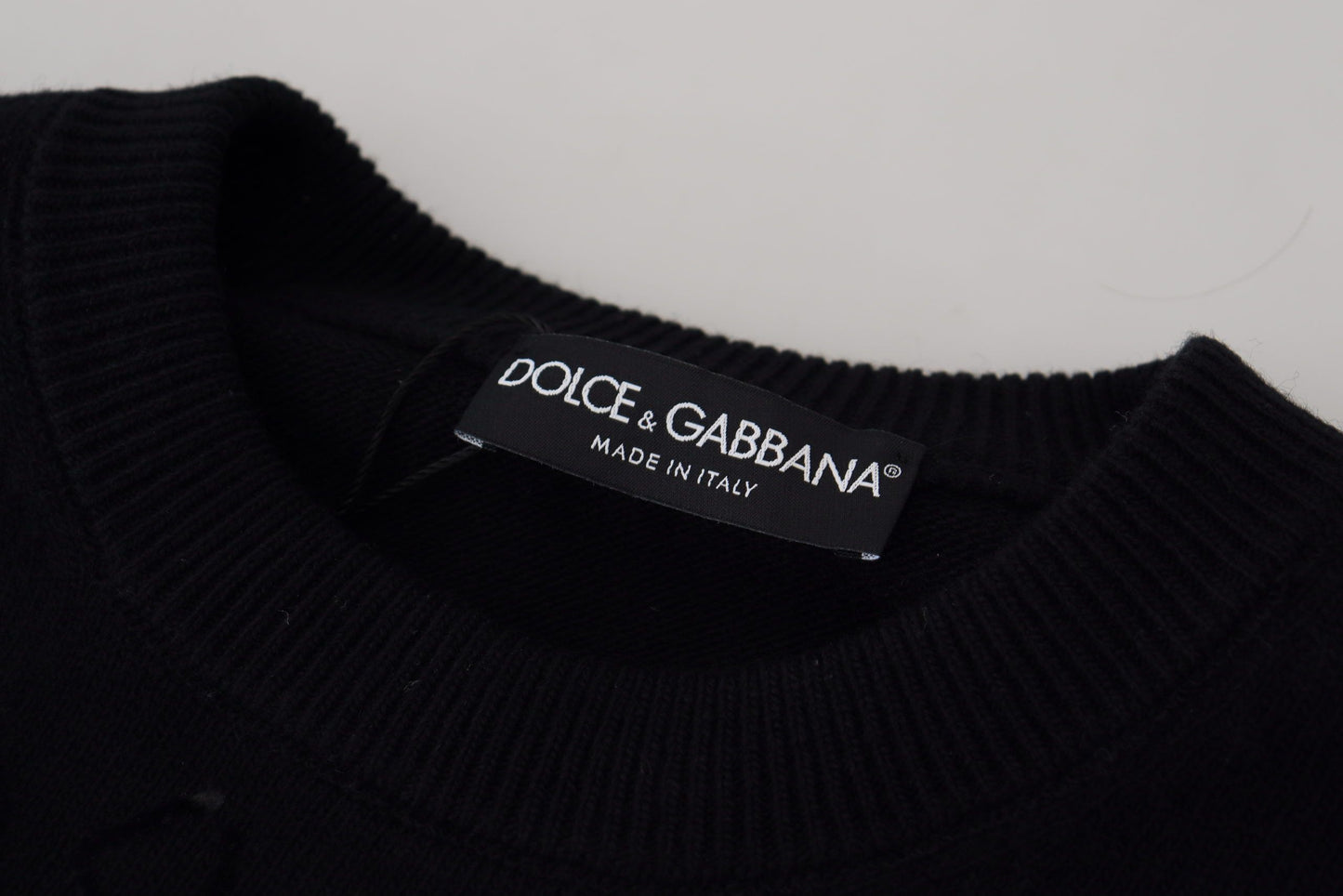 Suéter Dolce & Gabbana de lana negra con cuello redondo y logo estampado