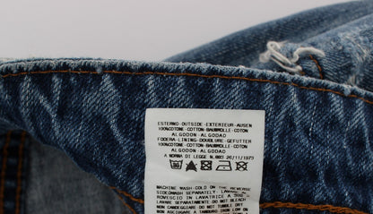 Vaqueros cropped John Galliano azules, efecto lavado, corte holgado