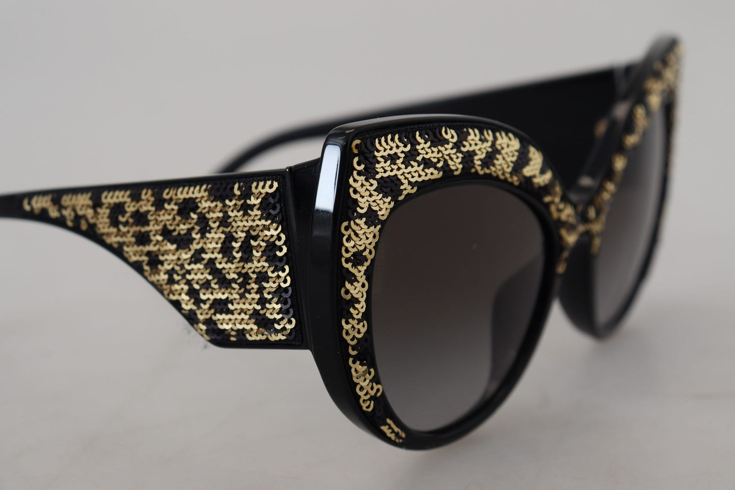 Gafas de sol Dolce & Gabbana DG4326 polarizadas de lente negra con mariposa dorada de lentejuelas