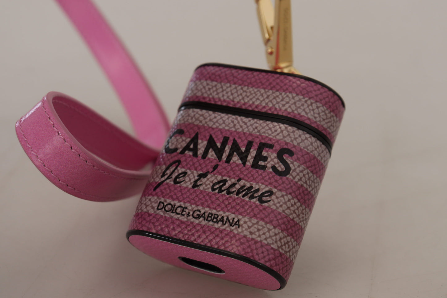 Estuche para AirPods Dolce & Gabbana de cuero rosa y negro con correa y logo metálico dorado