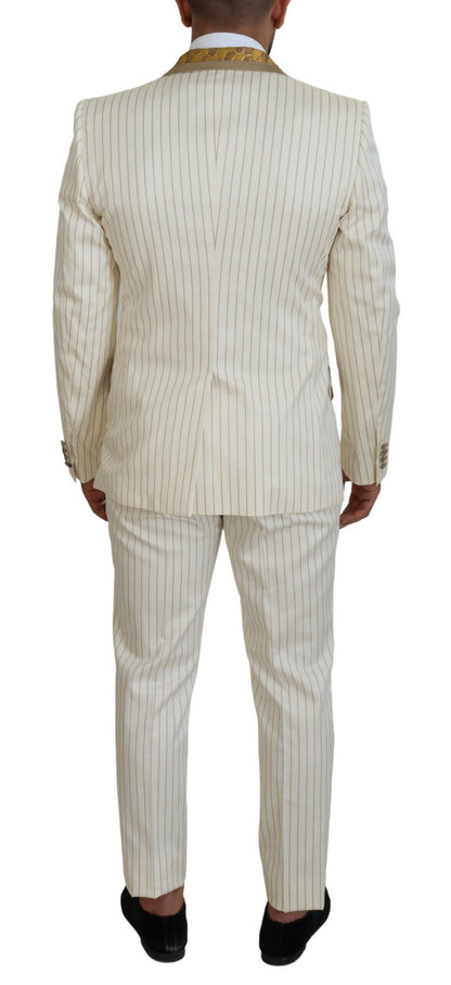 Traje de esmoquin a rayas blancas y doradas de corte slim de Dolce & Gabbana