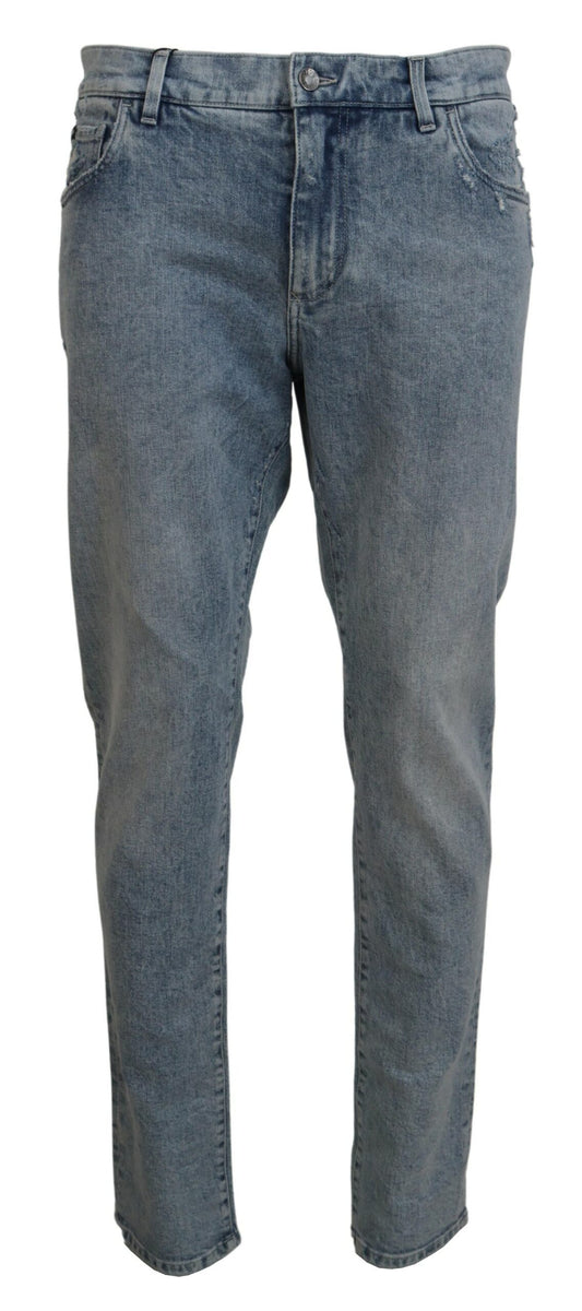 Jeans ajustados de algodón denim lavados en azul de Dolce & Gabbana