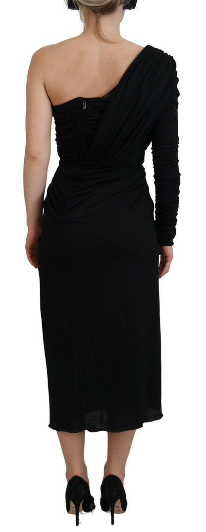 Vestido de lana Dolce & Gabbana negro, estilo tubo, cruzado y con un solo hombro