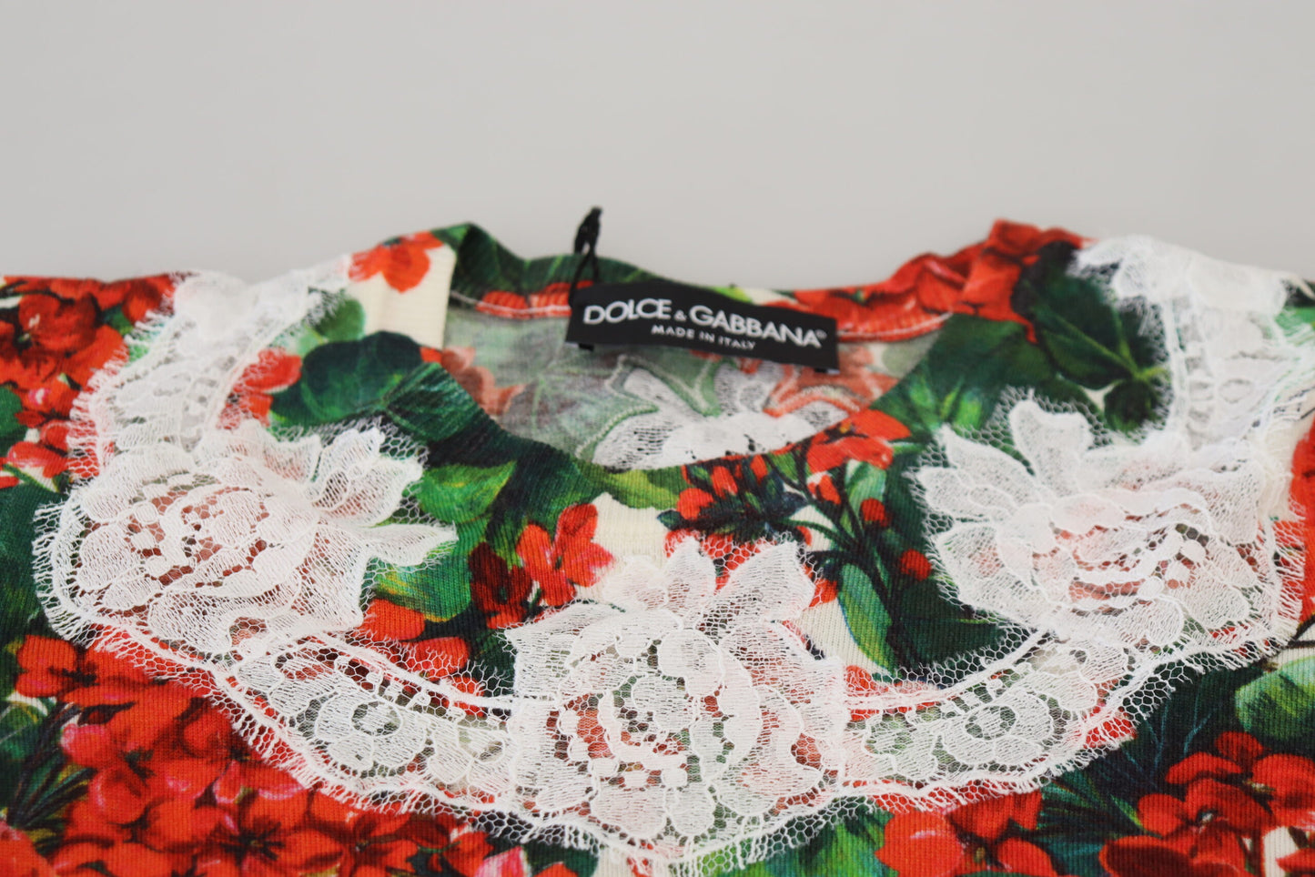 Top tipo chaleco de lana y encaje floral blanco de Dolce & Gabbana