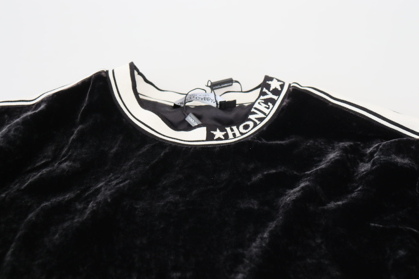 Suéter Dolce & Gabbana de terciopelo negro con cuello redondo