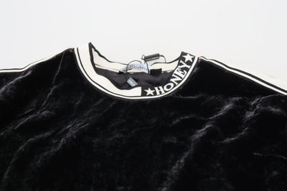 Suéter Dolce & Gabbana de terciopelo negro con cuello redondo