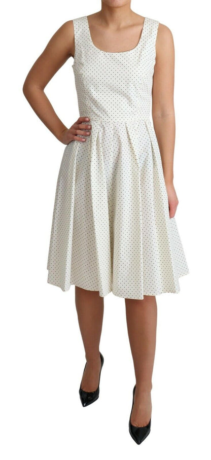 Vestido de algodón blanco de Dolce & Gabbana con lunares y corte en A