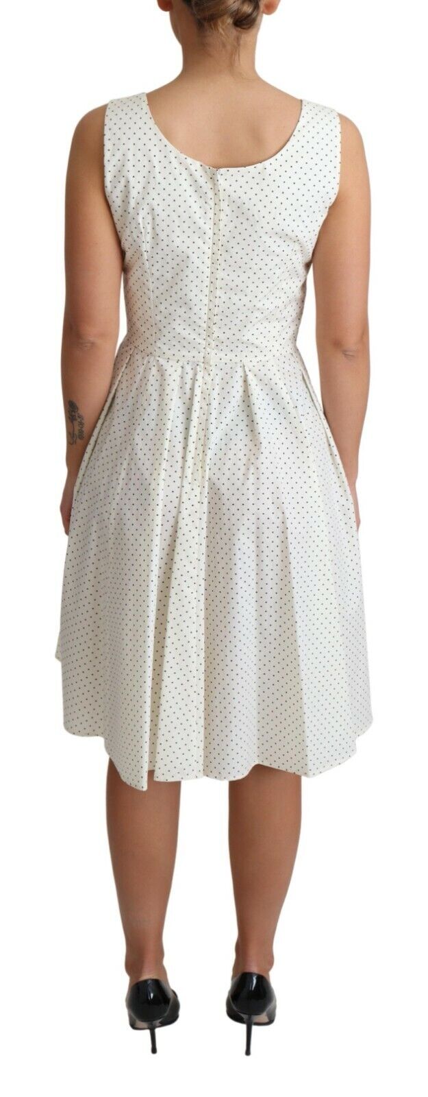 Vestido de algodón blanco de Dolce & Gabbana con lunares y corte en A