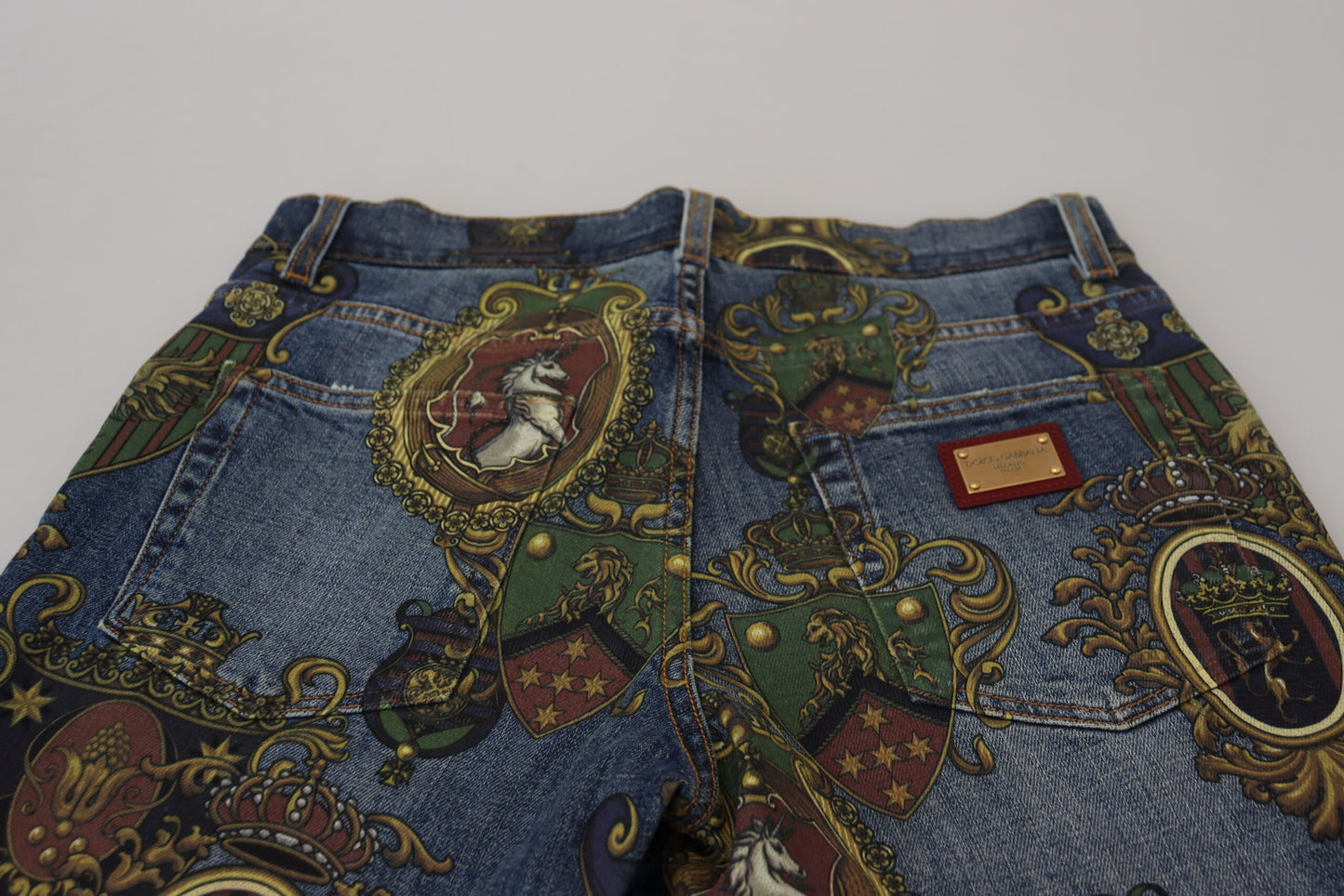 Jeans ajustados de algodón con estampado Medalla Azul de Dolce & Gabbana