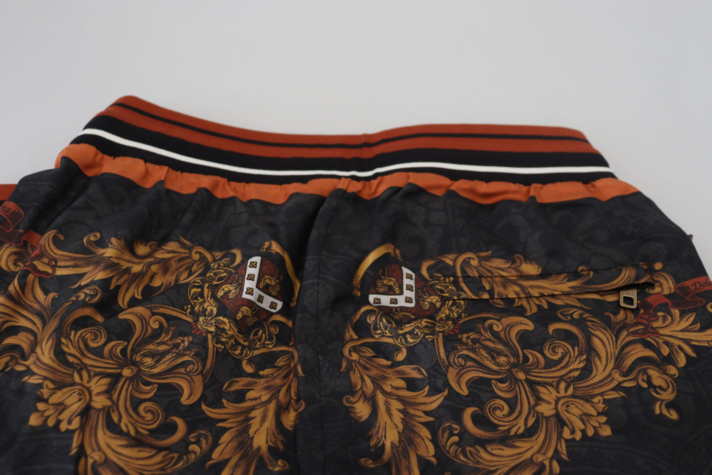 Pantalones deportivos Dolce & Gabbana de seda gris con corona barroca