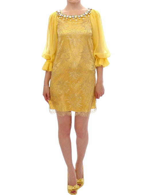 Vestido mini de encaje amarillo y cristales de Dolce & Gabbana