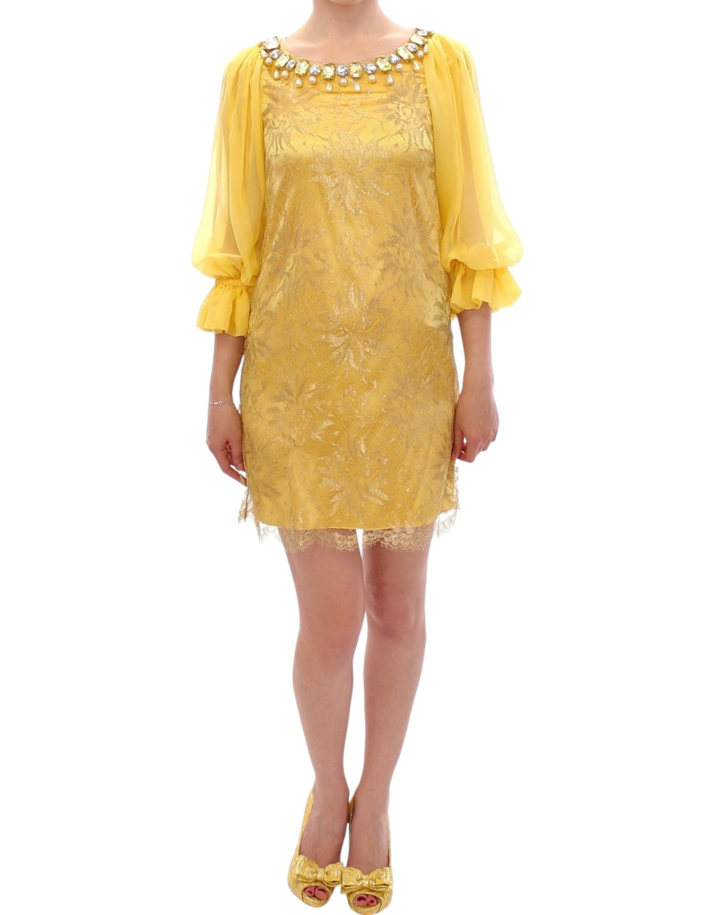 Vestido mini de encaje amarillo y cristales de Dolce & Gabbana