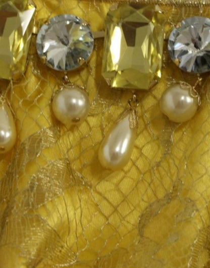 Vestido mini de encaje amarillo y cristales de Dolce & Gabbana
