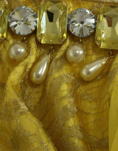 Vestido mini de encaje amarillo y cristales de Dolce & Gabbana