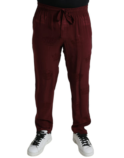 Pantalones de pijama de seda Dolce & Gabbana color granate con estampado de corona