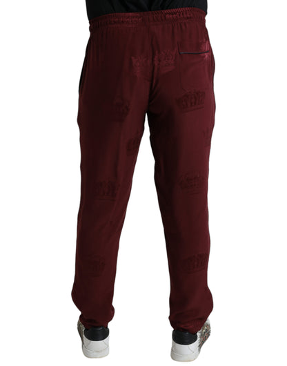 Pantalones de pijama de seda Dolce & Gabbana color granate con estampado de corona