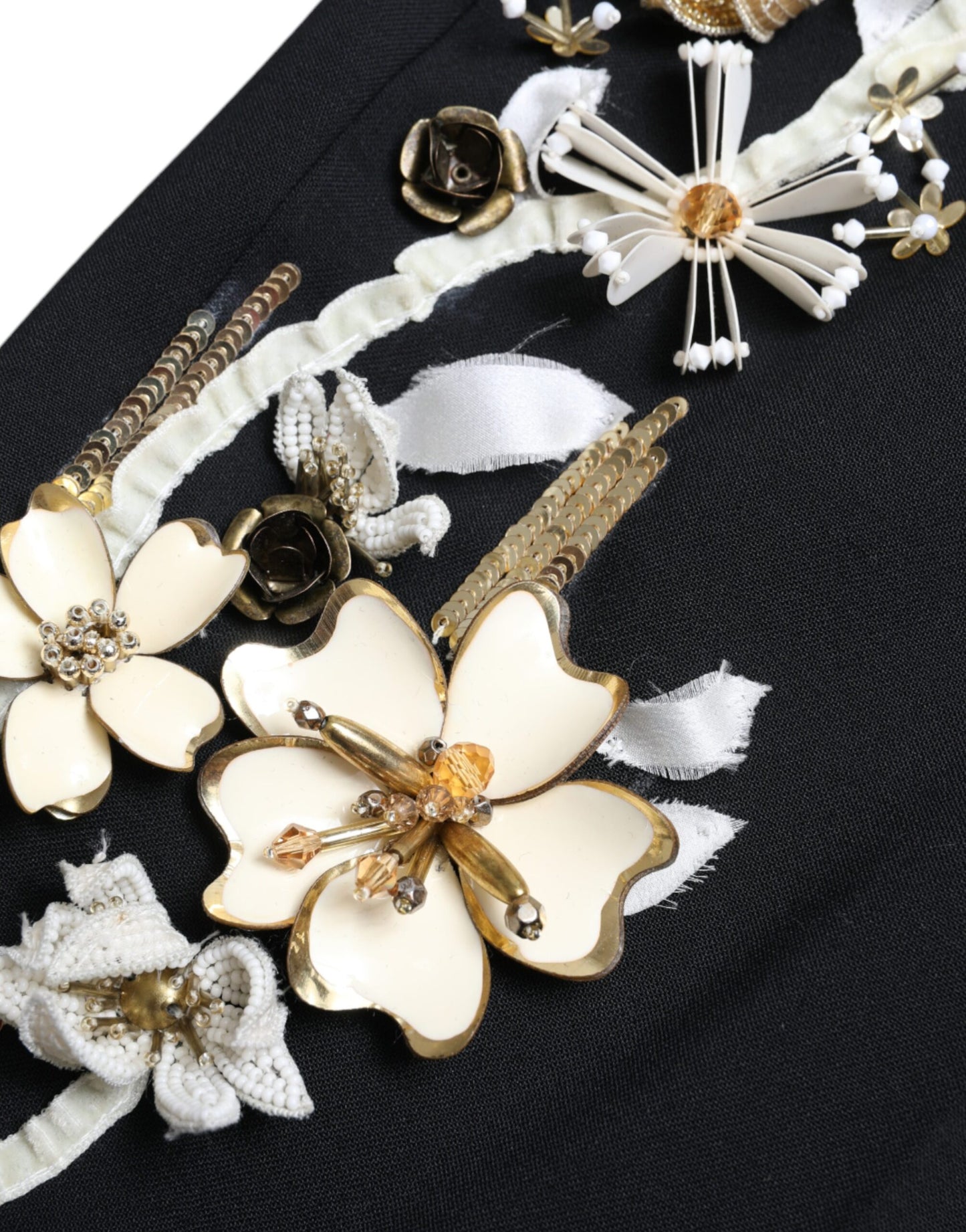 Pantalones cónicos de talle alto con apliques florales negros de Dolce & Gabbana