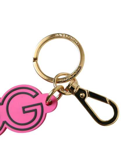 Llavero Dolce & Gabbana rosa de goma con logo DG de metal dorado