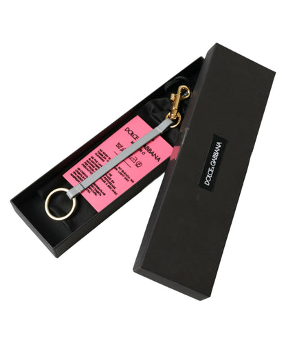 Llavero Dolce & Gabbana de latón dorado con logo DG de silicona rosa