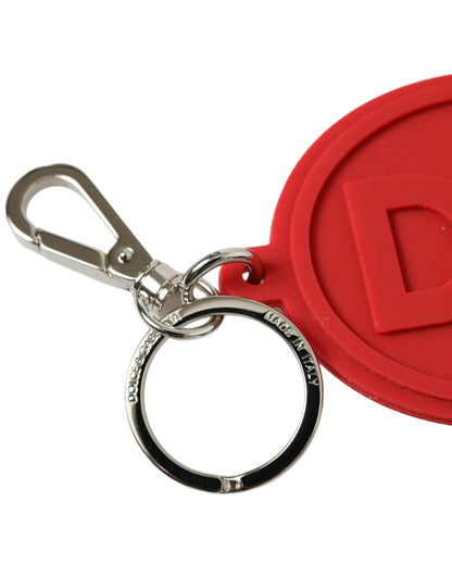 Llavero Dolce & Gabbana de goma roja con logotipo DG y metal de latón plateado