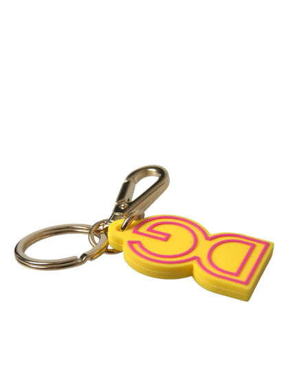 Llavero Dolce & Gabbana de goma amarillo con logo DG en metal dorado