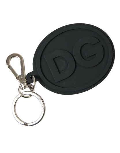 Llavero Dolce & Gabbana de goma negra con logo DG y herrajes de latón plateado