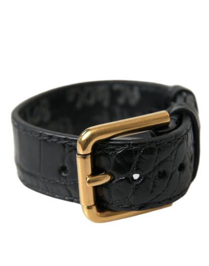 Brazalete Dolce & Gabbana de cuero texturizado negro con hebilla de metal dorado