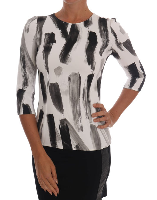 Top blusa con estampado a rayas blancas y negras de Dolce & Gabbana