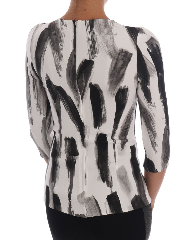 Top blusa con estampado a rayas blancas y negras de Dolce & Gabbana