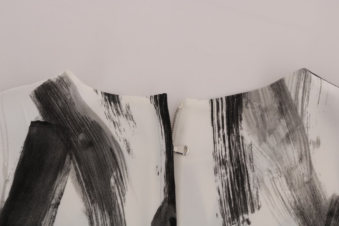 Top blusa con estampado a rayas blancas y negras de Dolce & Gabbana