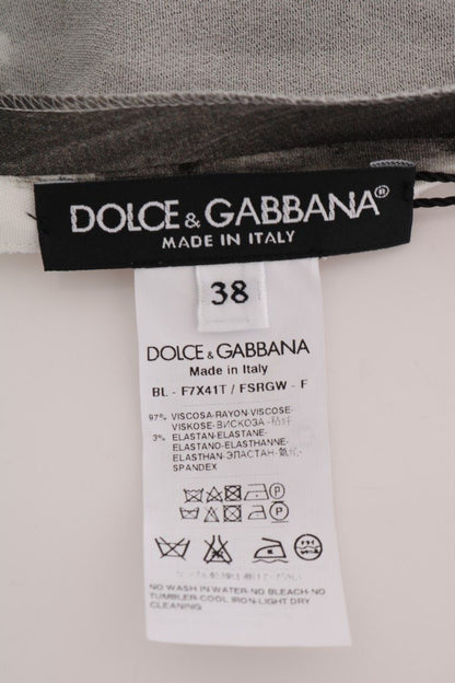 Top blusa con estampado a rayas blancas y negras de Dolce & Gabbana