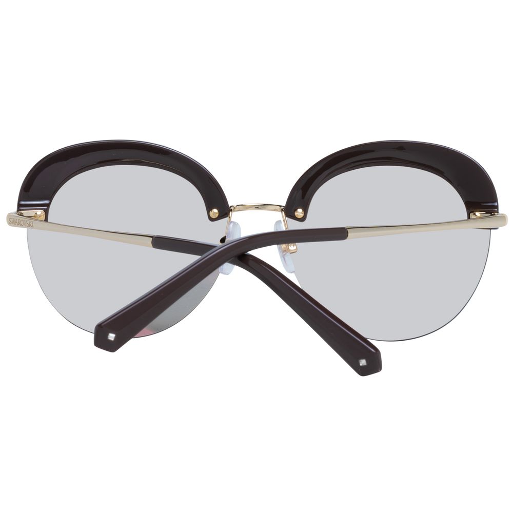 Gafas de sol Swarovski de metal dorado y plástico