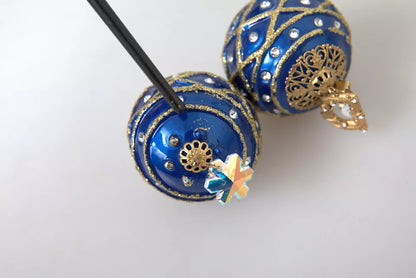 Pendientes de clip de bola de Navidad colgantes de cristal azul de latón dorado Dolce & Gabbana
