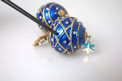 Pendientes de clip de bola de Navidad colgantes de cristal azul de latón dorado Dolce & Gabbana