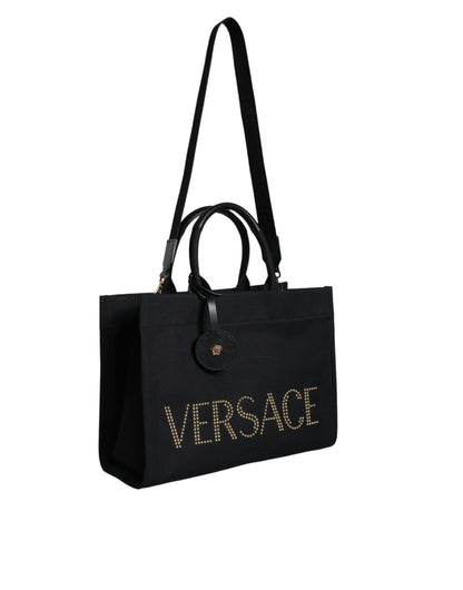 Bolso tote cruzado de mano Versace negro de lona y cuero con logo